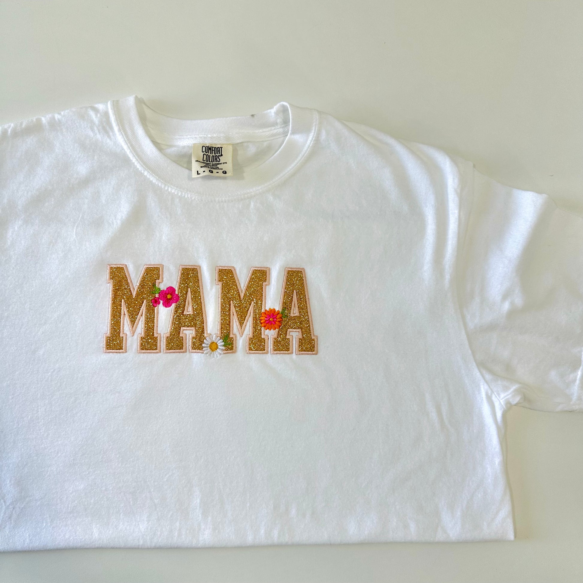 white mama t-shirt, laying flat